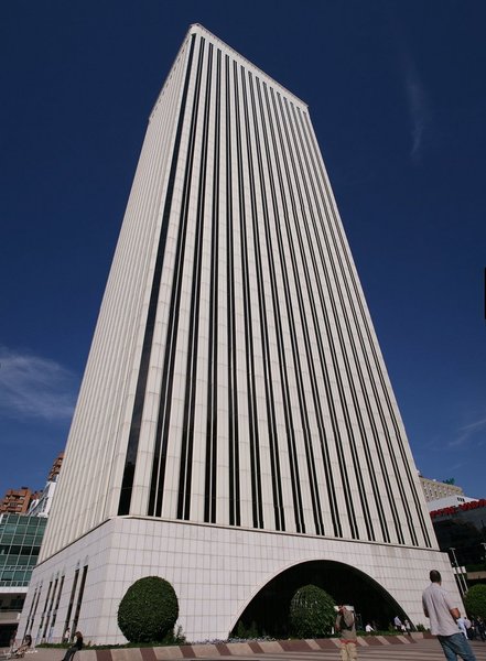 Based on this building. Torre Picasso, Madrid, Spain.